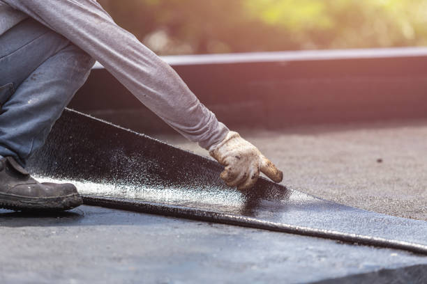 Professional Basement Waterproofing technician working in Bunker Hill, IL